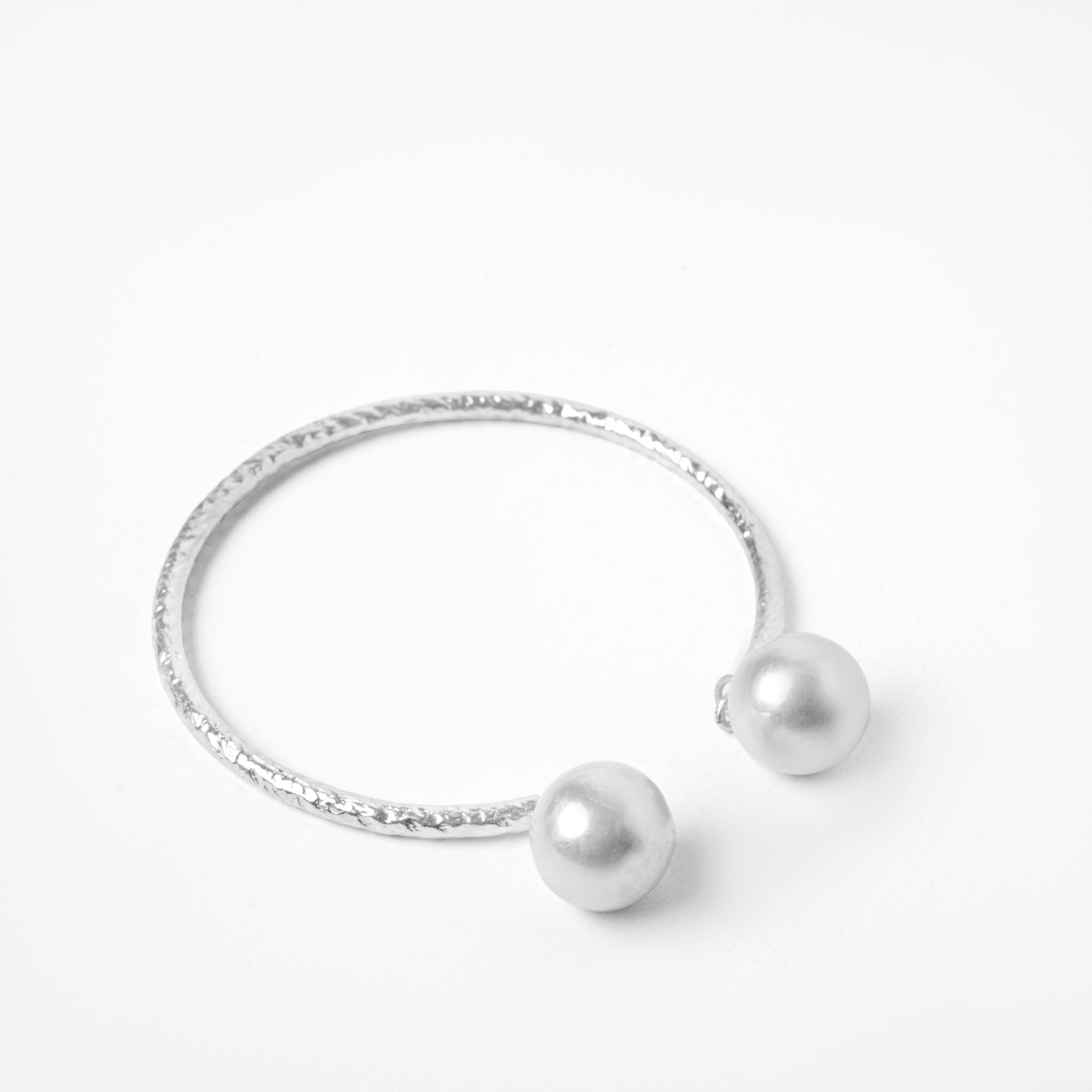 DUALDROP BANGLE - SILVER TONE, a product by Equiivalence