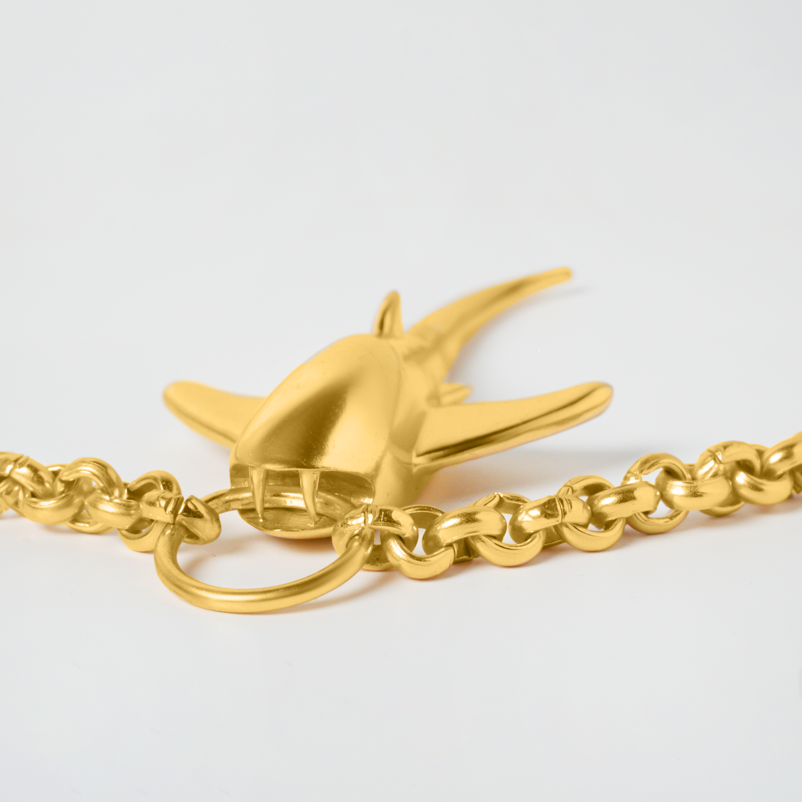 Thumbnail preview #1 for SHARK NECKLACE GOLD TONE 