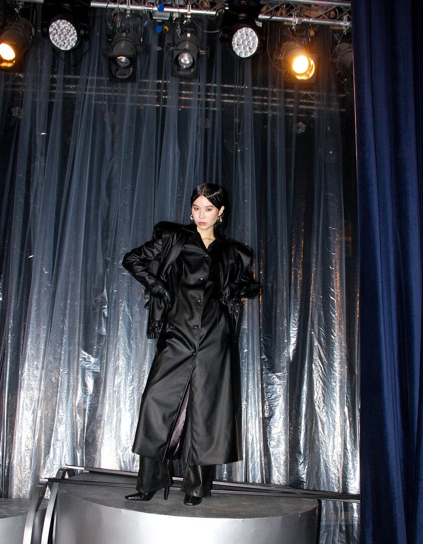 Layered black trench coat, a product by BLIKVANGER
