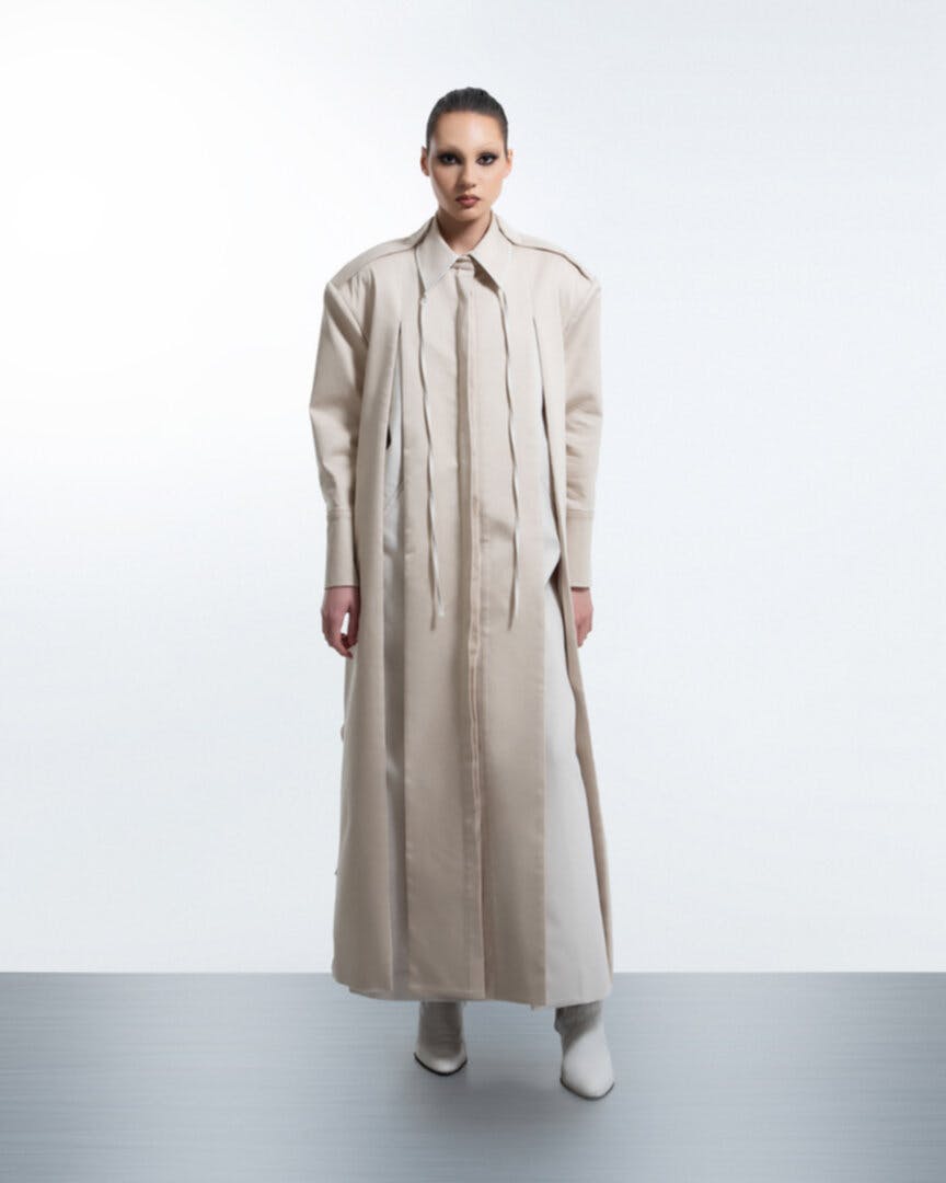 Layered crumple-back beige trench, a product by BLIKVANGER