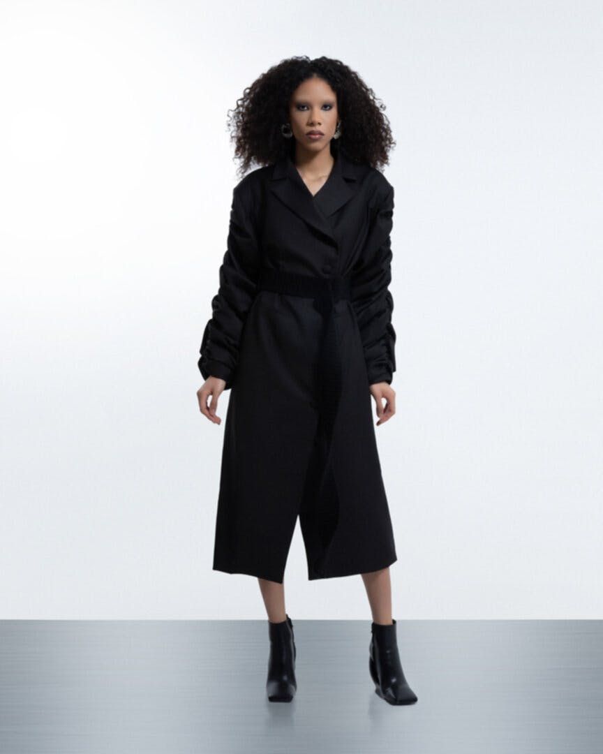 Crumple-sleeve black trench coat, a product by BLIKVANGER