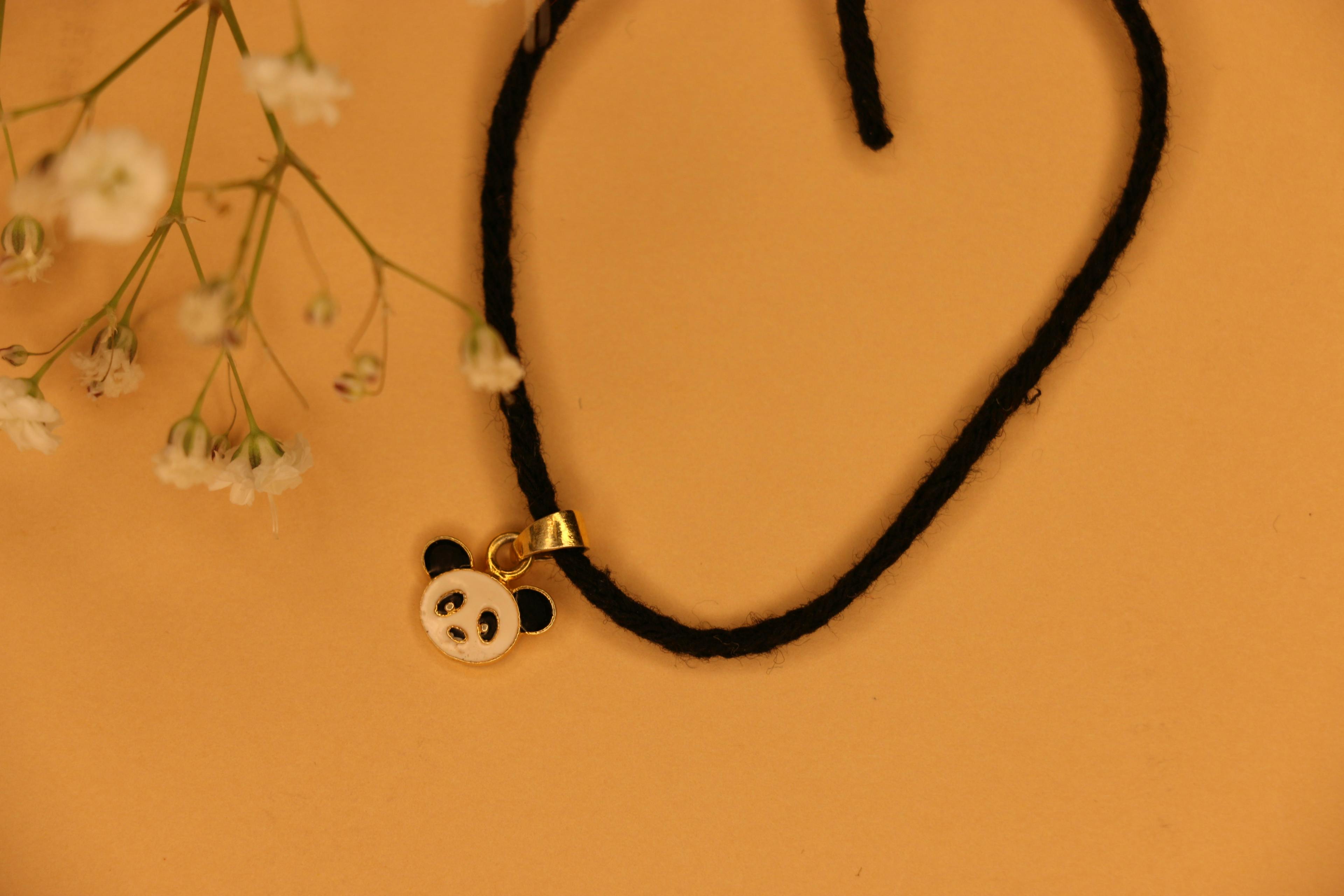 Thumbnail preview #1 for Panda kids black thread nazarbattu